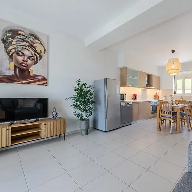 A person is opening the door to a hotel room.